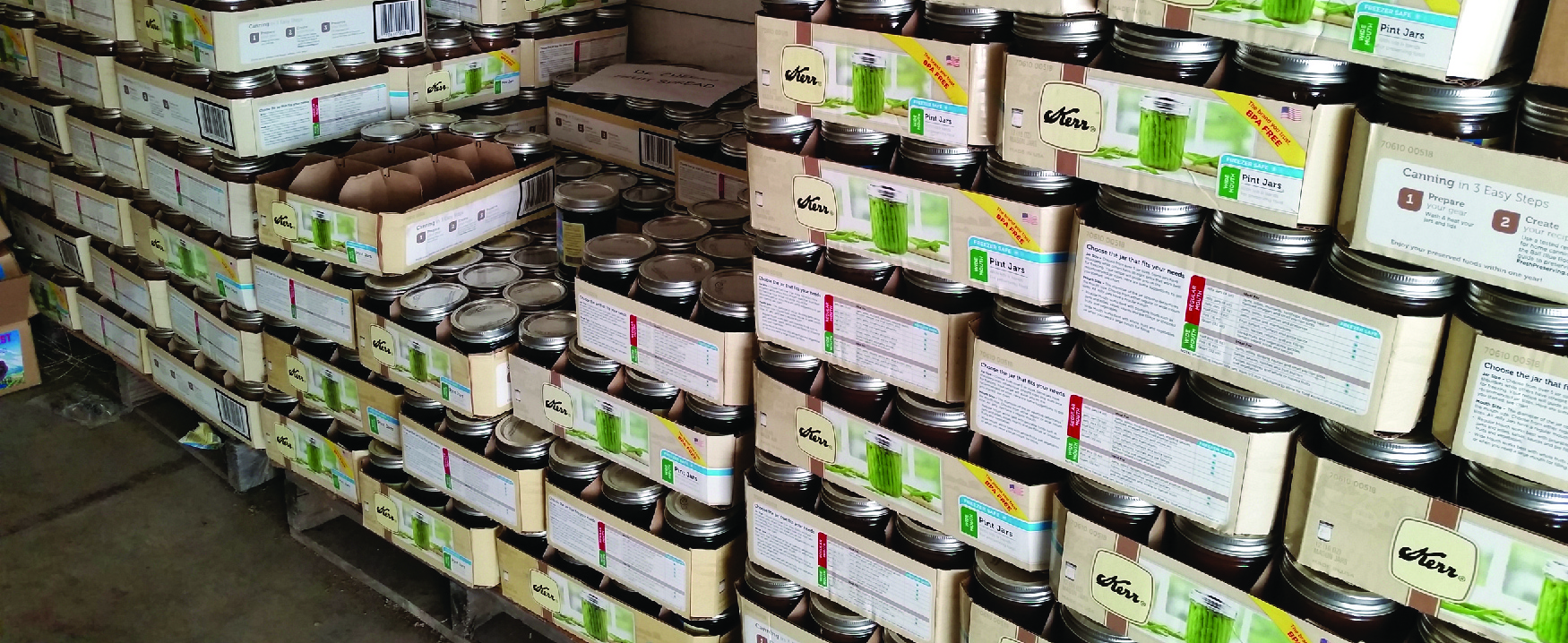 A photograph shows boxes of canning jars.